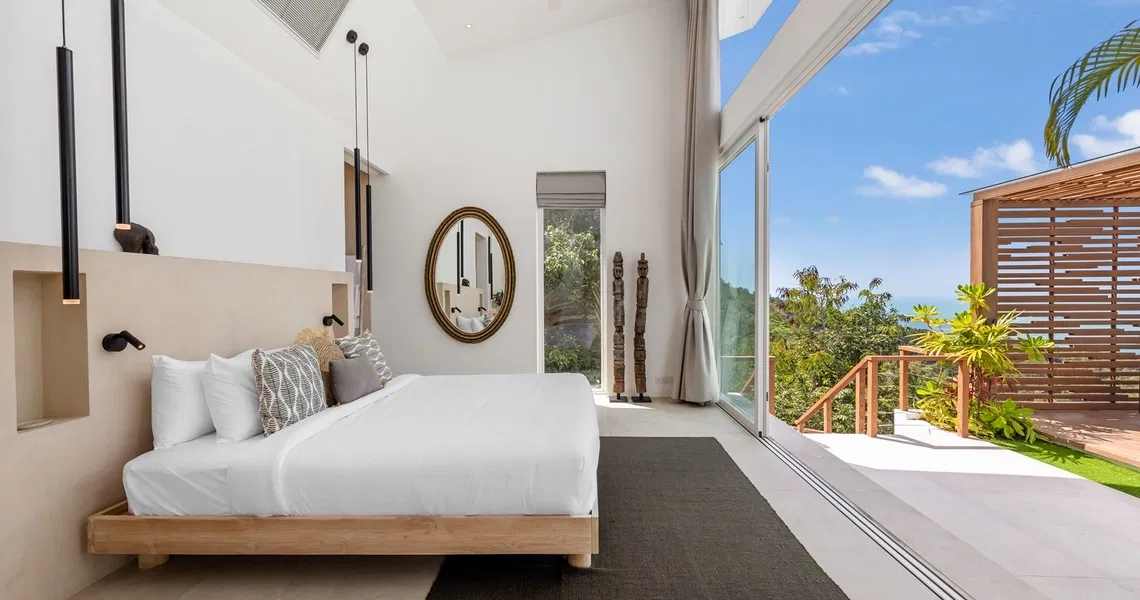 Pacific Palisade Samui luxury villa - bedroom with deck access