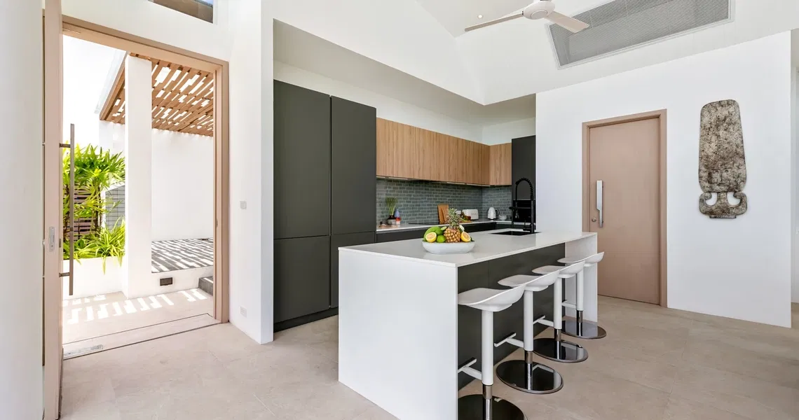 Pacific Palisade Samui luxury villa - kitchen and bar stools