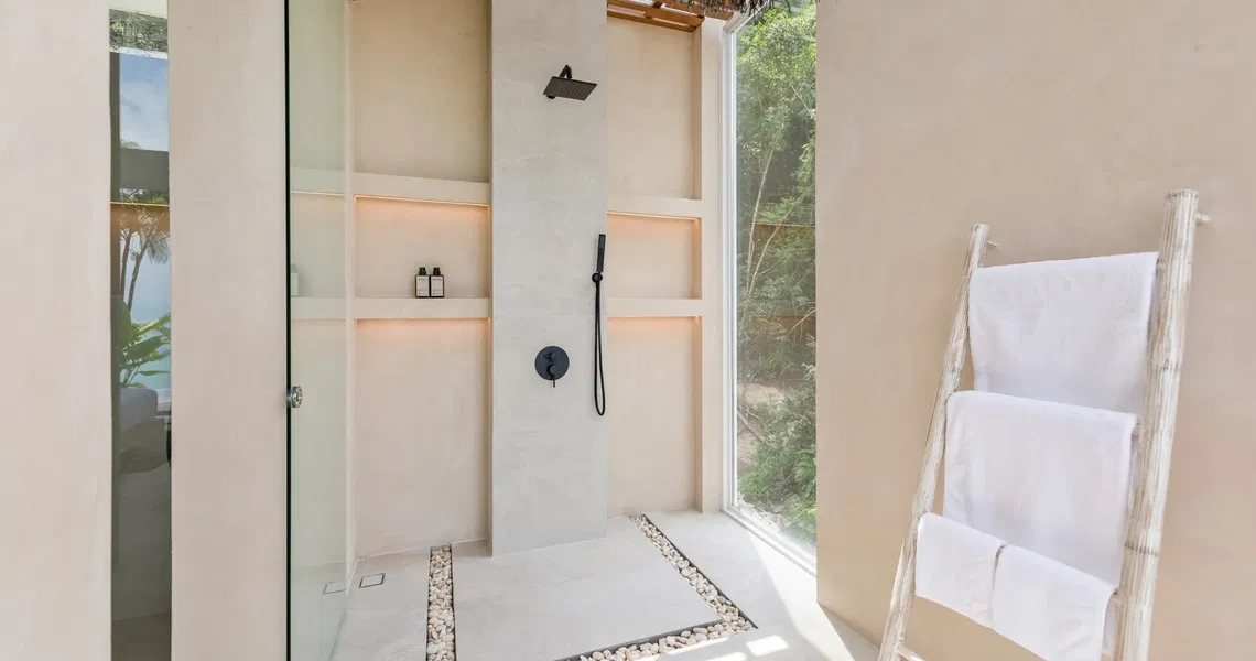 Pacific Palisade Samui luxury villa - shower with window overlooking jungle